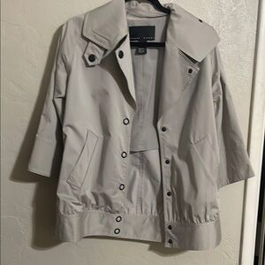 Cream Trench Coat with Prominent Collar and Lightweight Fabric